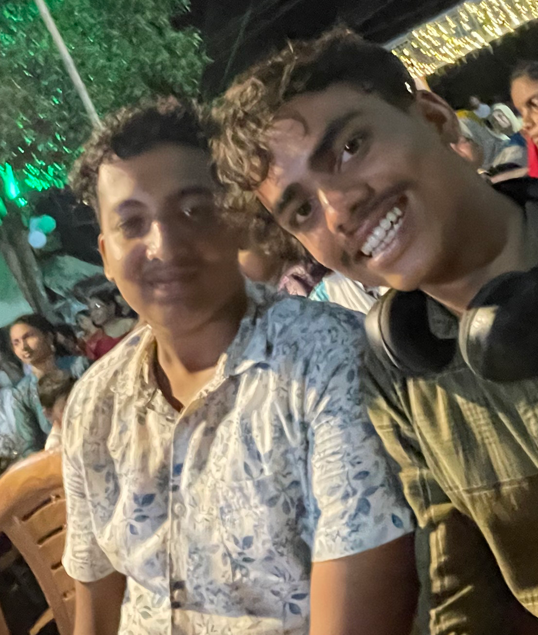 Sajad with his friend Mishal in 2024 during a public stage event live streaming by Hap Media