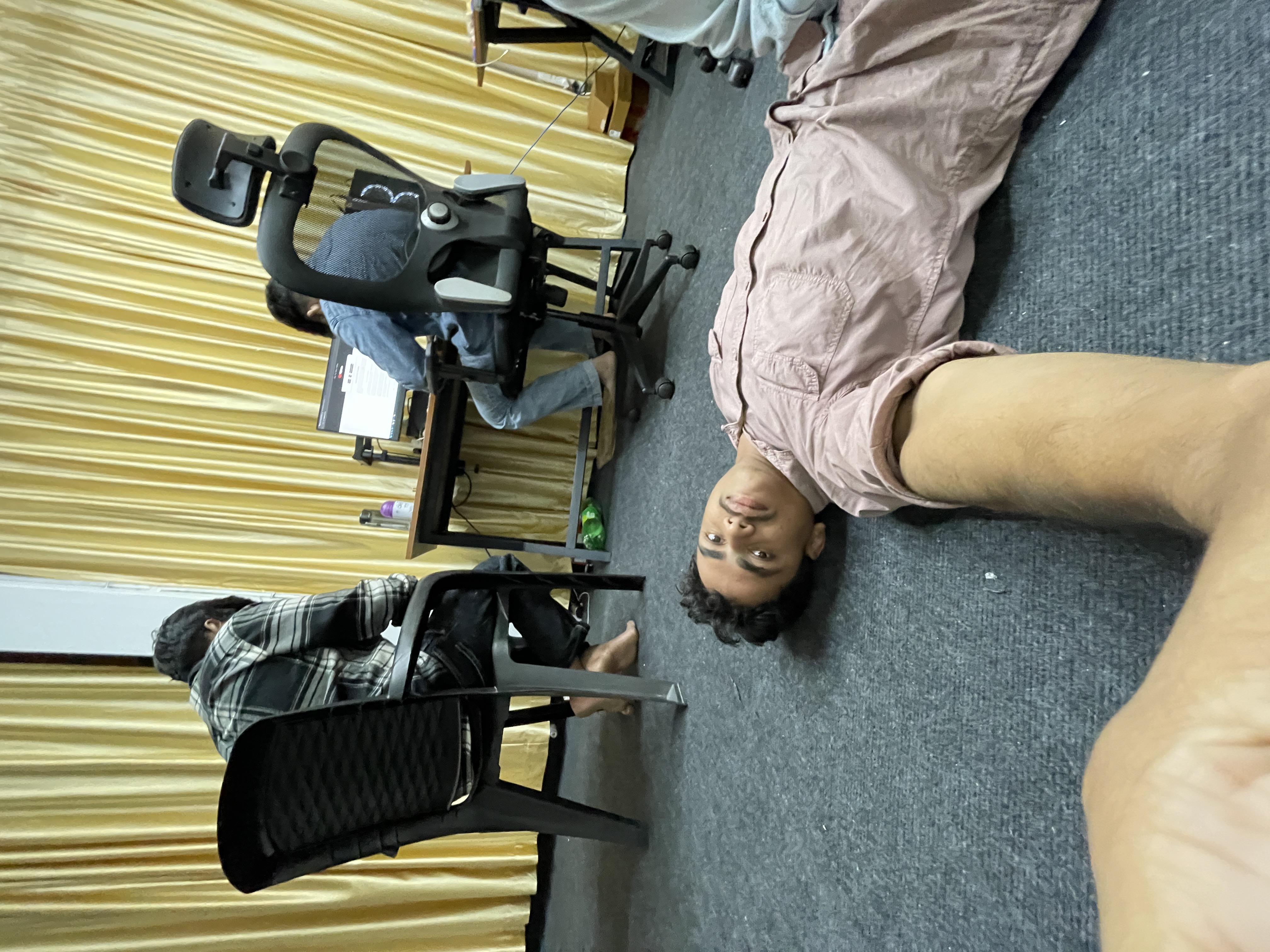 Sajad in 2025 resting at Sequenza Productions office after a long day of creative work